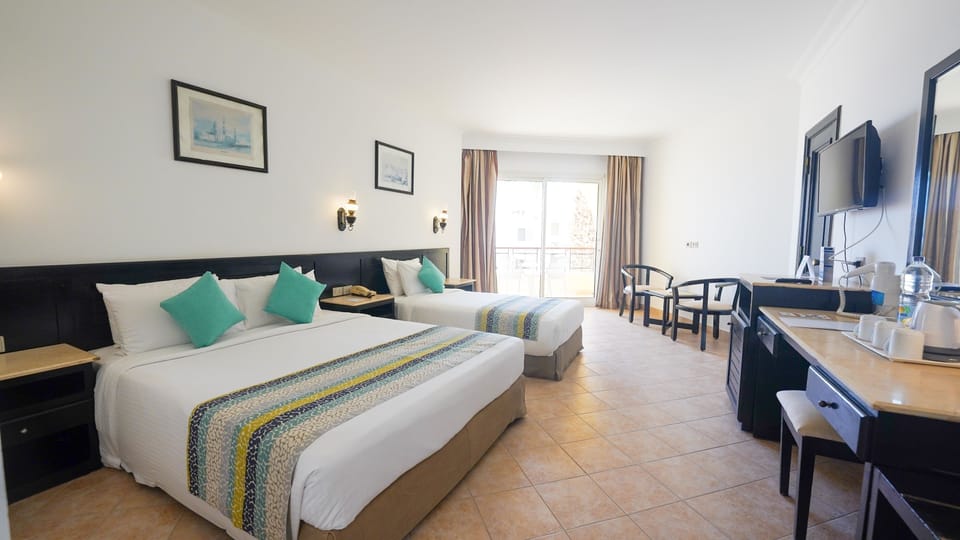 Minibar, in-room safe, iron/ironing board, free cribs/infant beds