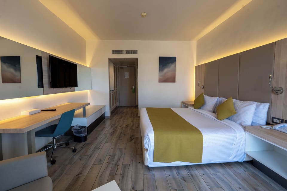 Minibar, in-room safe, iron/ironing board, free cribs/infant beds