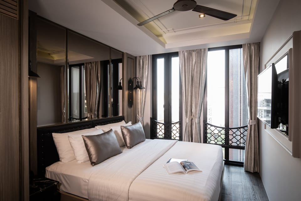 Two Bedroom Premier Suite | Minibar, in-room safe, desk, free cribs/infant beds