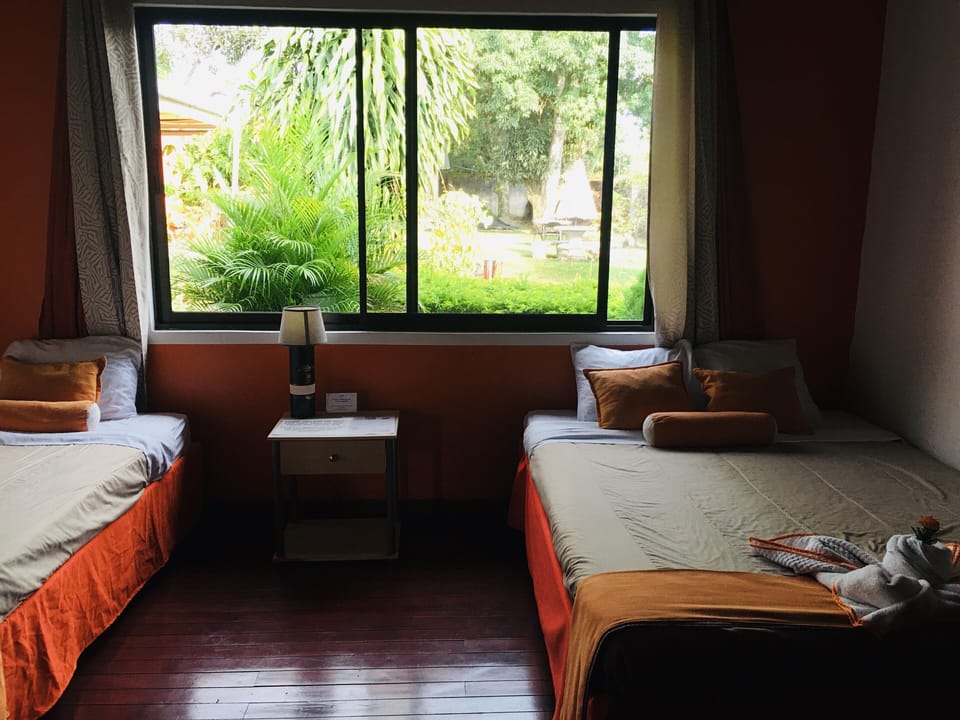 Basic Triple Room, 1 Bedroom, Non Smoking, Garden View | Egyptian cotton sheets, premium bedding, down comforters