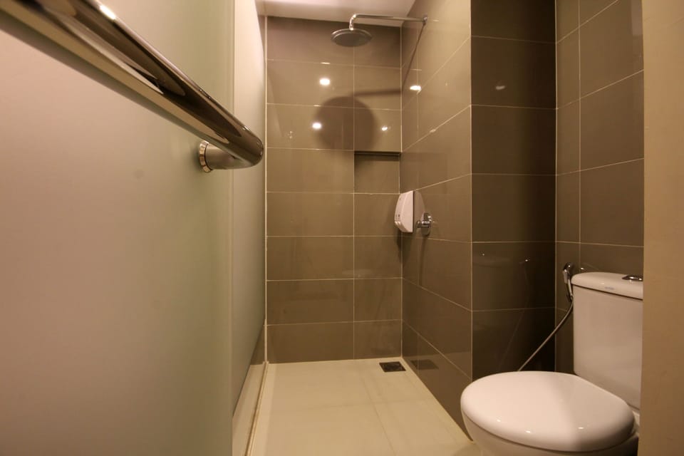 Shower, free toiletries, slippers, towels
