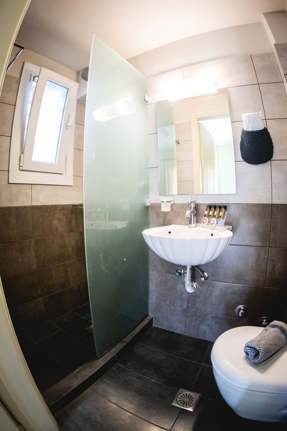 Shower, free toiletries, hair dryer, slippers
