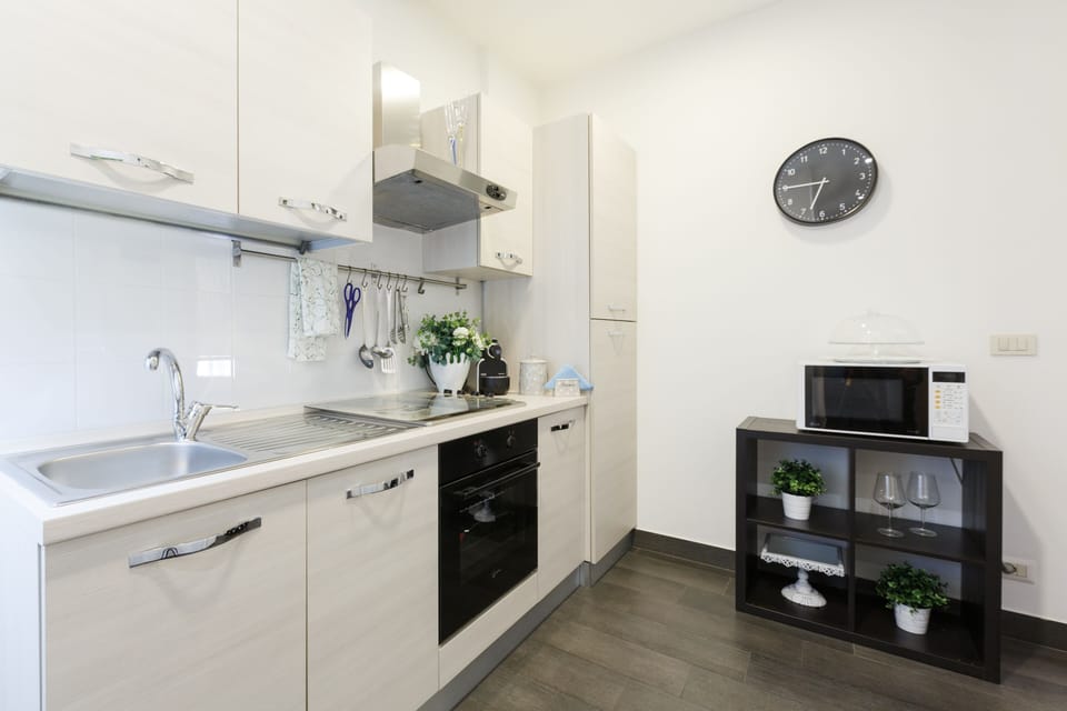 Shared fridge, microwave, espresso maker, coffee/tea maker