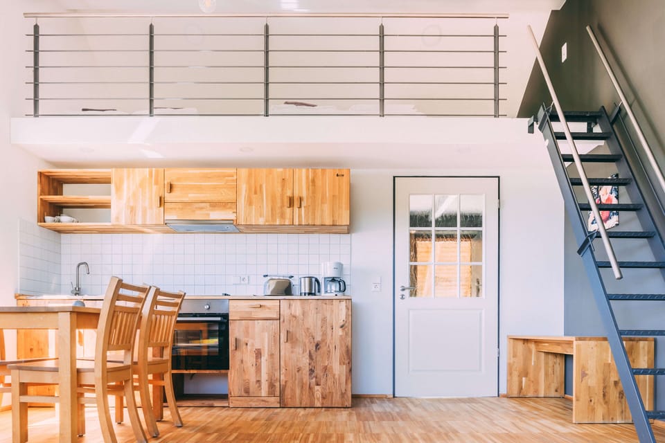 Panoramic Studio, Kitchenette, Garden View | Living area | 44-inch flat-screen TV with satellite channels, TV, toys