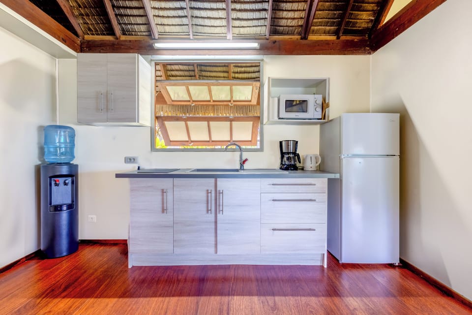 Traditional Bungalow, 2 Queen Beds, Beach View, Garden Area (Auti - sleeps 4) | Private kitchen | Coffee/tea maker, full-size fridge, microwave, stovetop