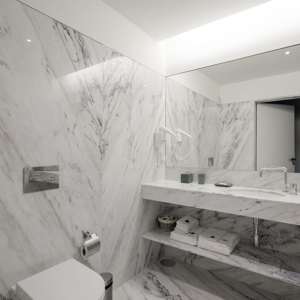 Shower, free toiletries, hair dryer, bathrobes