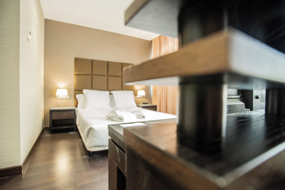 Premium bedding, minibar, desk, laptop workspace