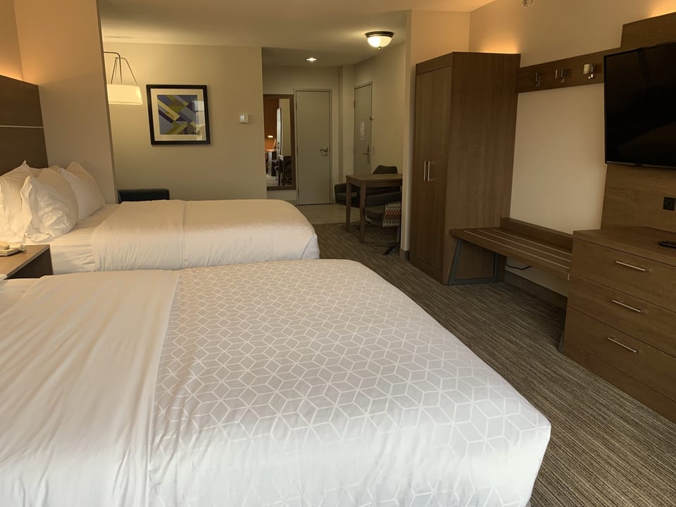 Suite, 2 Queen Beds | In-room safe, desk, iron/ironing board, free cribs/infant beds