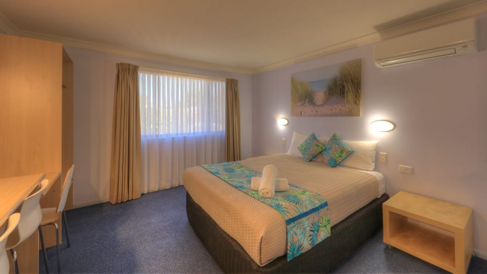 Premium bedding, desk, laptop workspace, WiFi (free)
