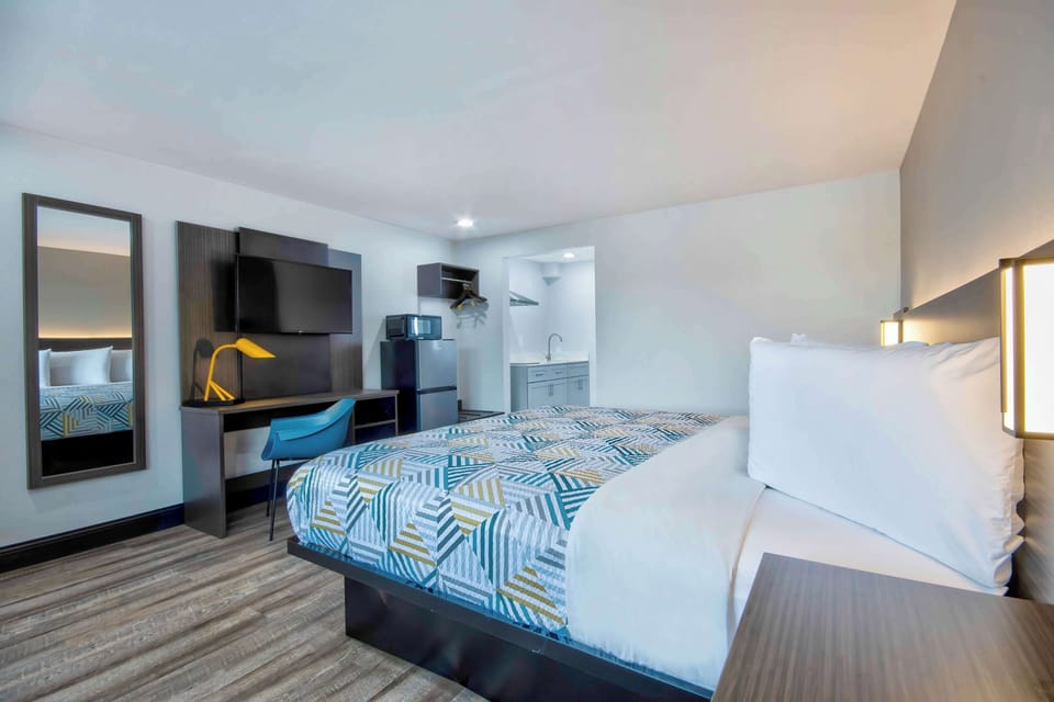 Blackout drapes, iron/ironing board, WiFi (free), bed sheets