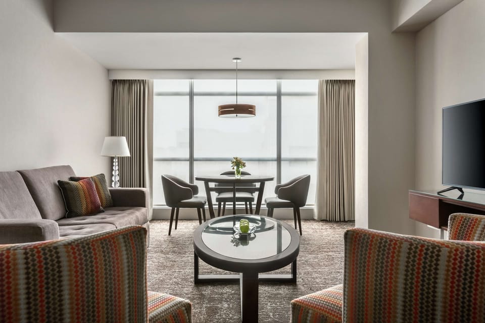 Suite, 2 Double Beds | Minibar, in-room safe, desk, laptop workspace