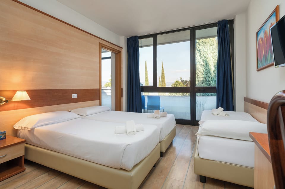 Family Room, Multiple Beds | In-room safe, desk, cribs/infant beds, bed sheets