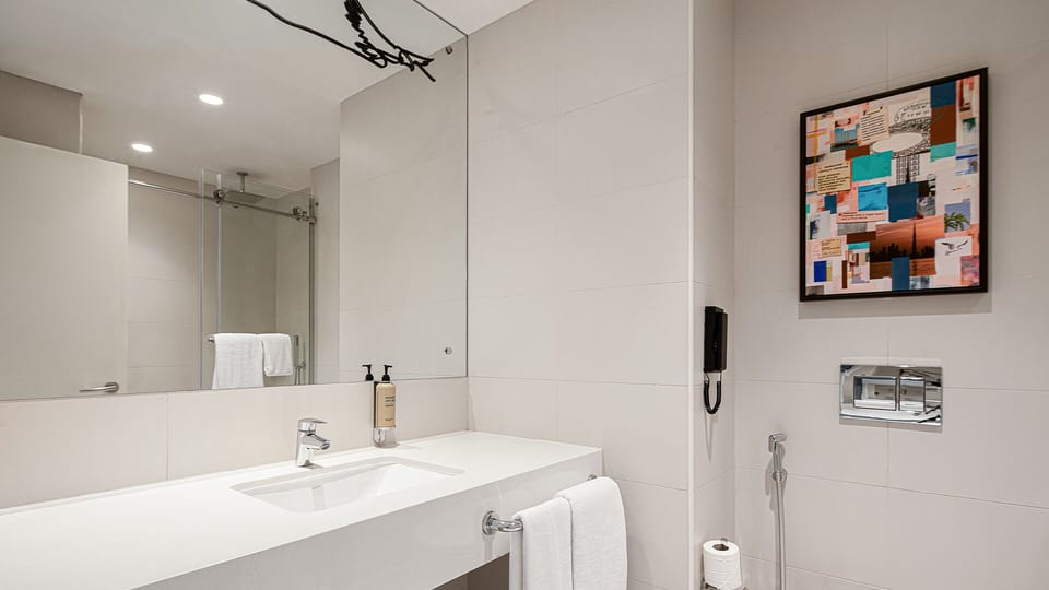 Rover Plus Room - Easy Access To Sheikh Zayed Road & Bur Dubai | Bathroom | Shower, rainfall showerhead, hair dryer, towels