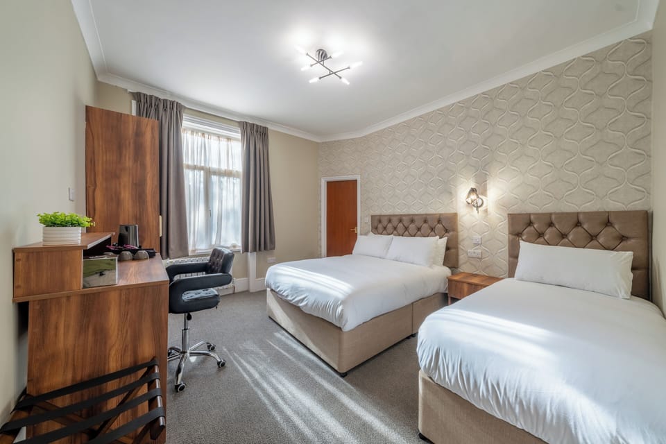 Family Room | 1 bedroom, desk, iron/ironing board, free WiFi