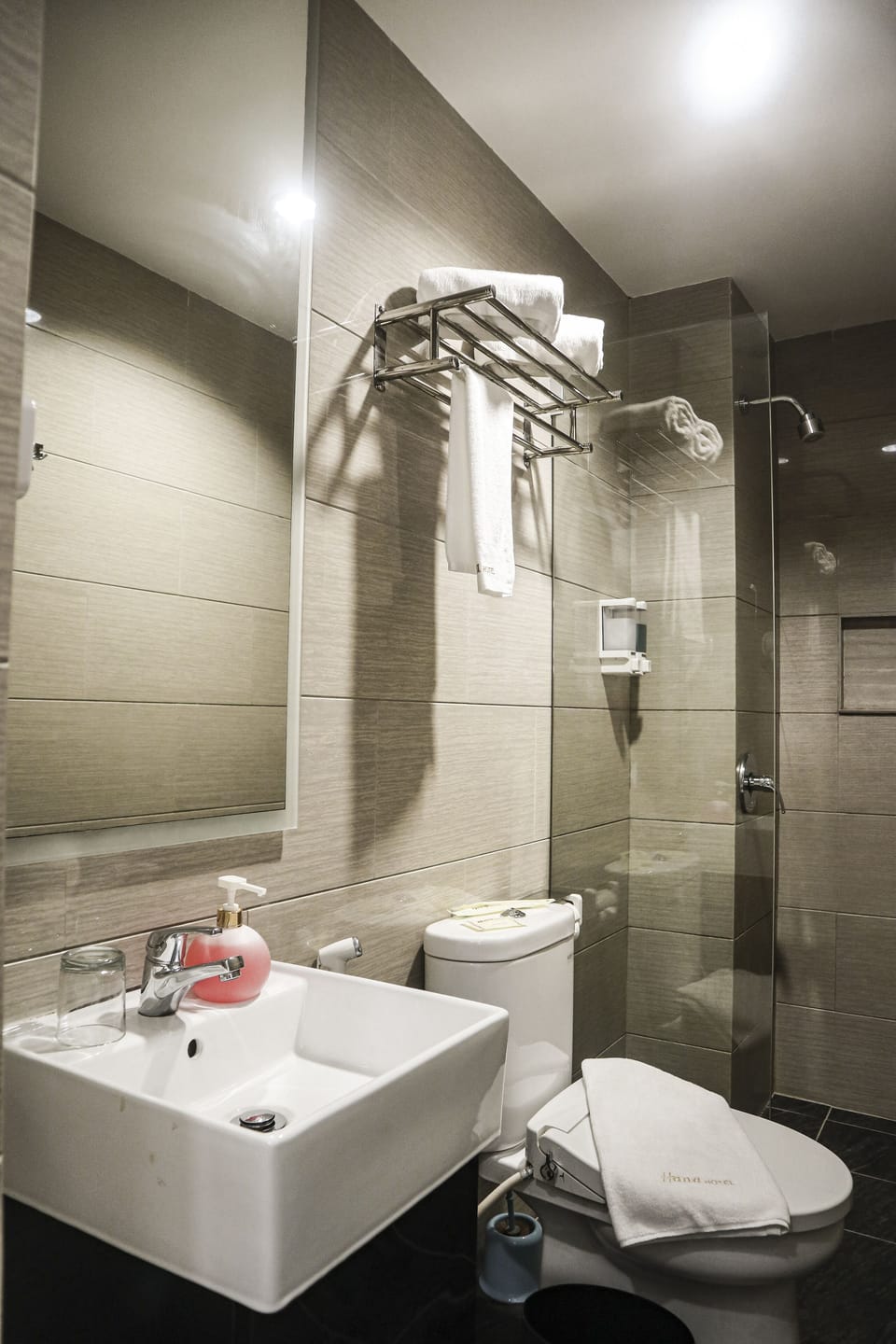 Shower, free toiletries, slippers, towels