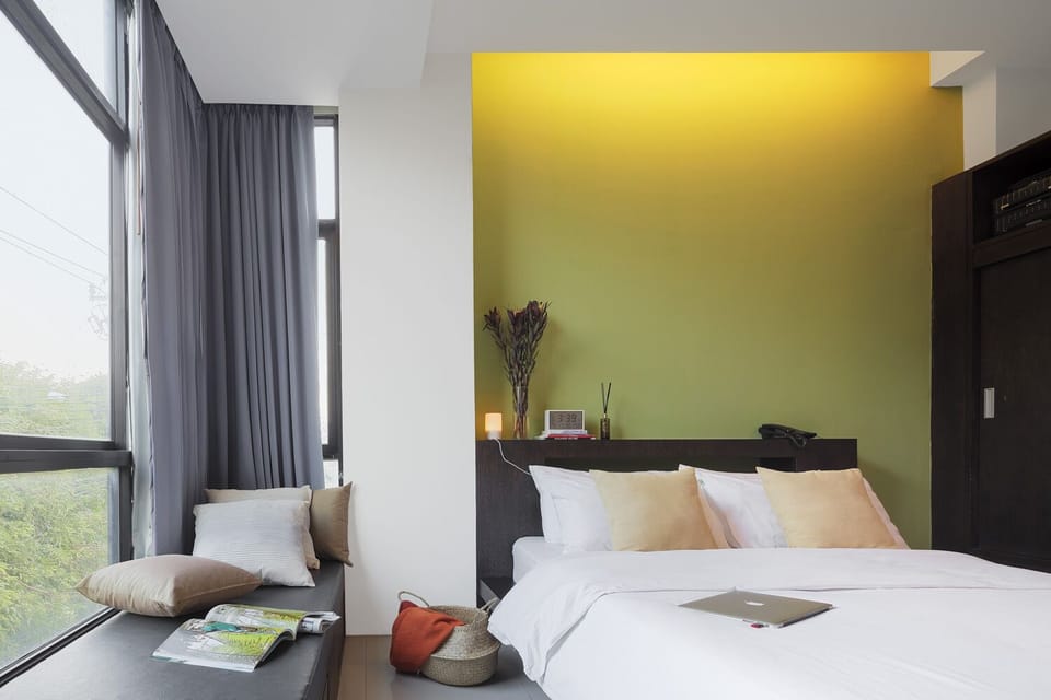 Deluxe Room | Desk, blackout drapes, free WiFi