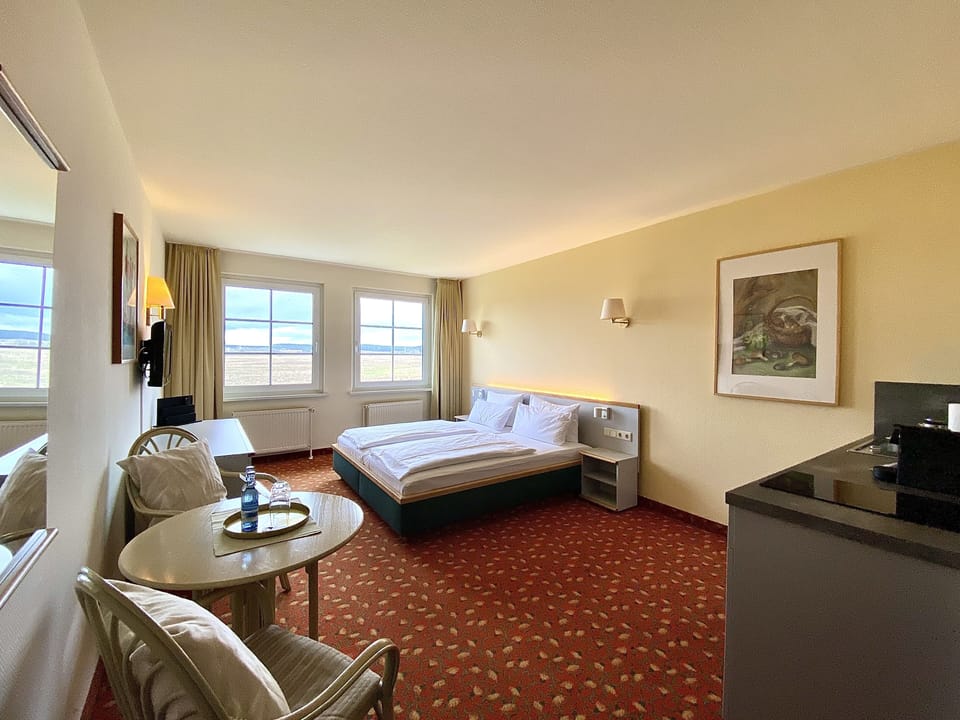 Studio Suite | Living area | 43-inch LED TV with satellite channels, TV