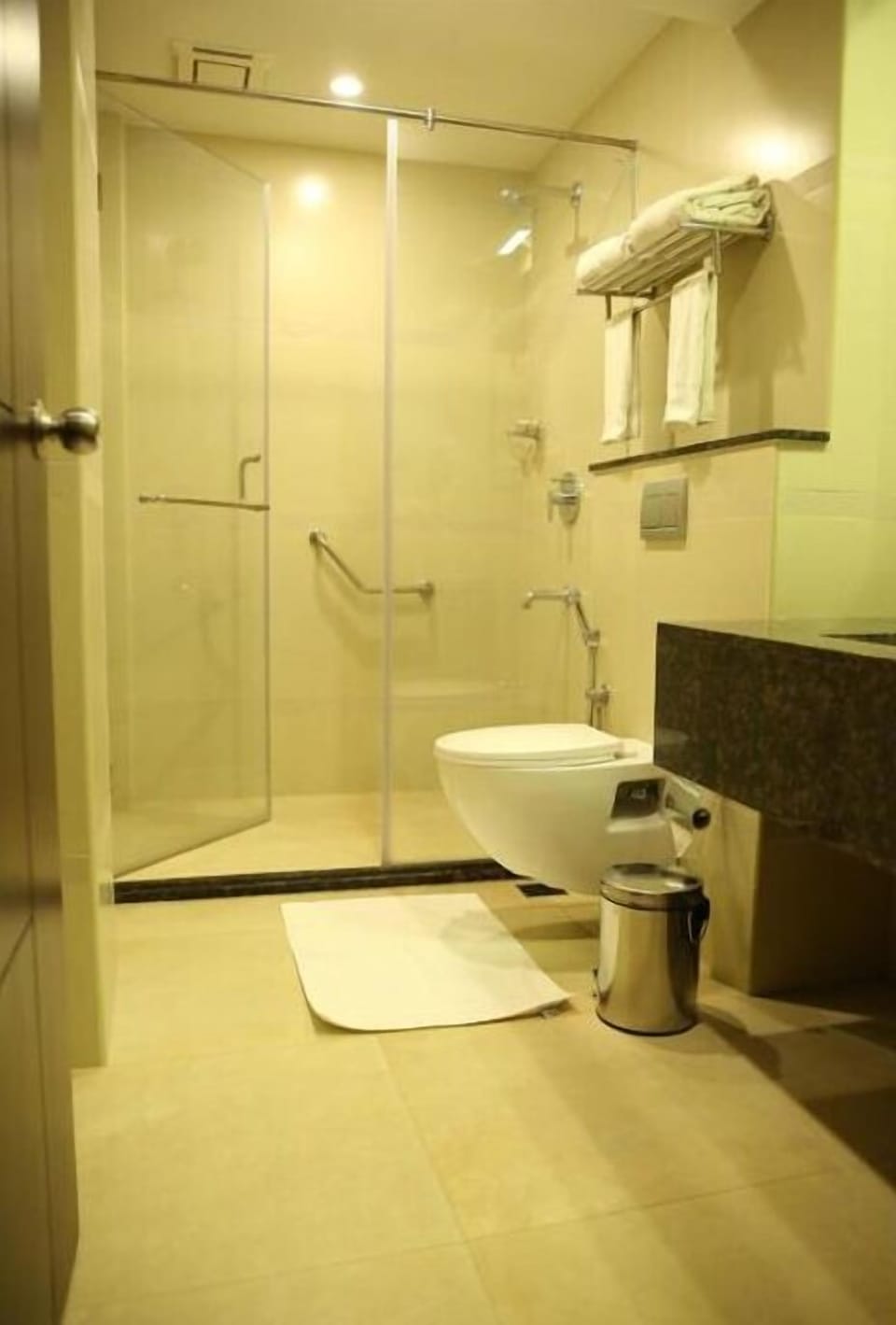 Shower, rainfall showerhead, designer toiletries, hair dryer