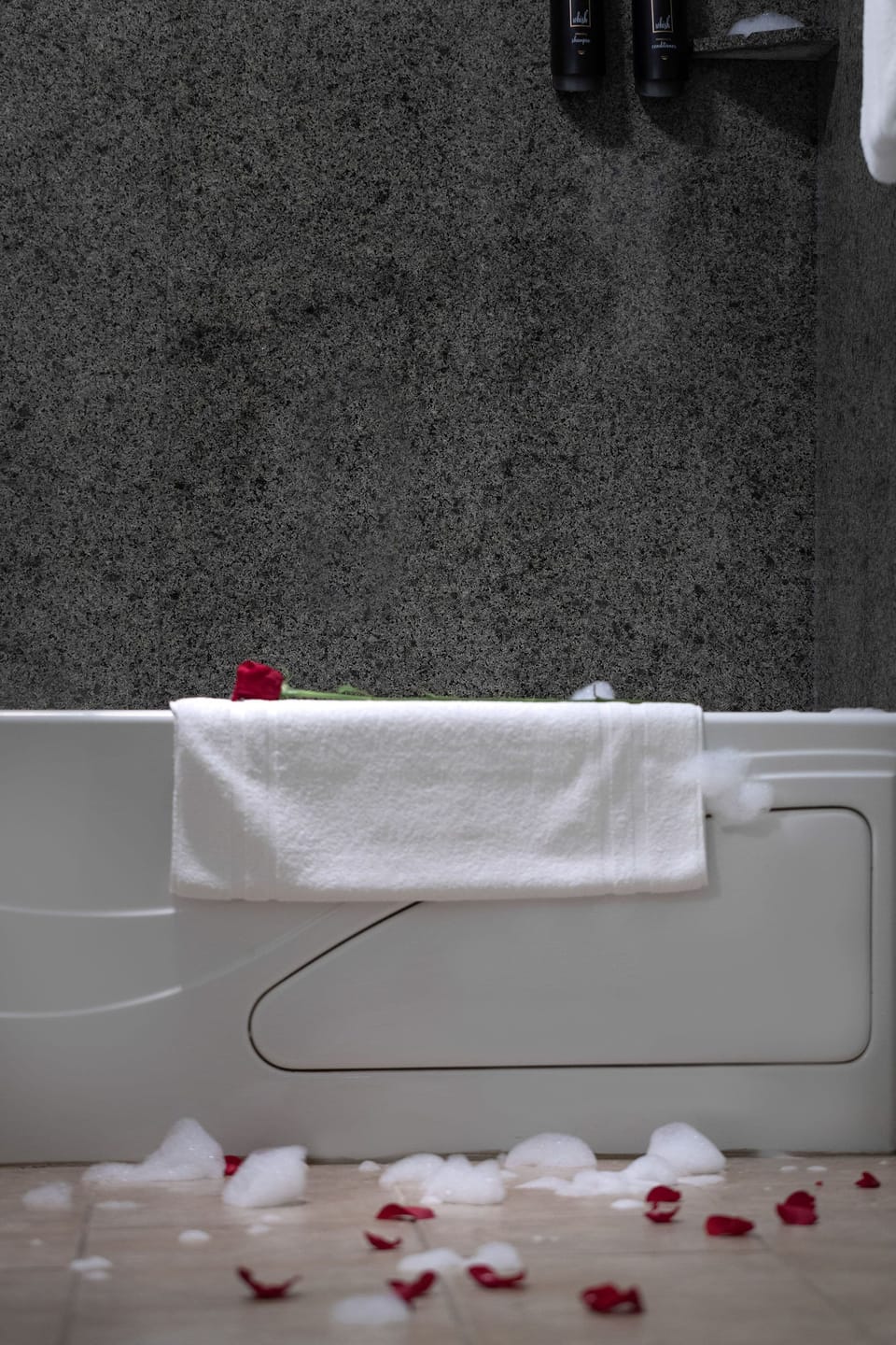 Combined shower/tub, jetted tub, designer toiletries, hair dryer