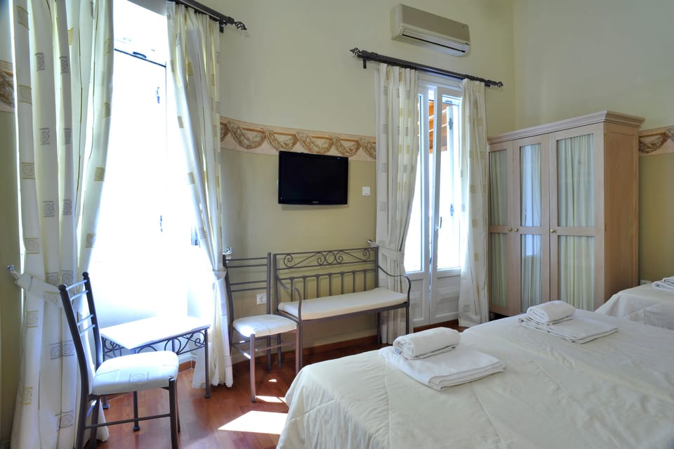 Triple Room, Balcony | Iron/ironing board, free WiFi