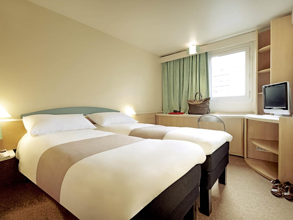 Desk, soundproofing, iron/ironing board, free cribs/infant beds