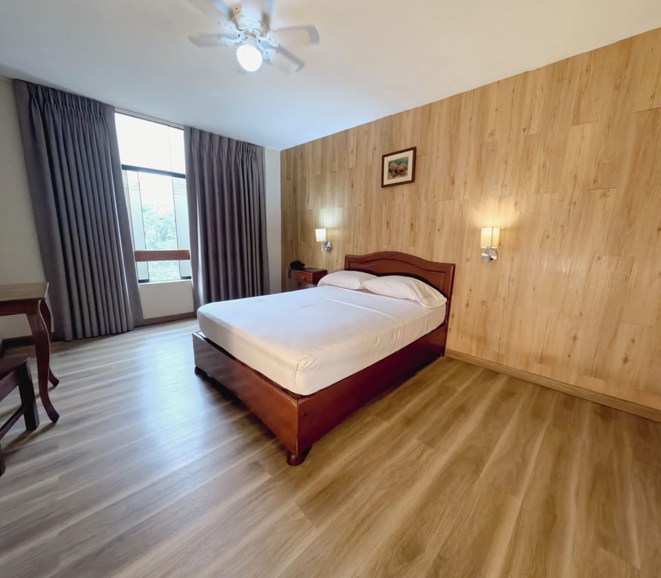 Basic Single Room, 1 Double Bed | Laptop workspace, blackout drapes, iron/ironing board (on request)