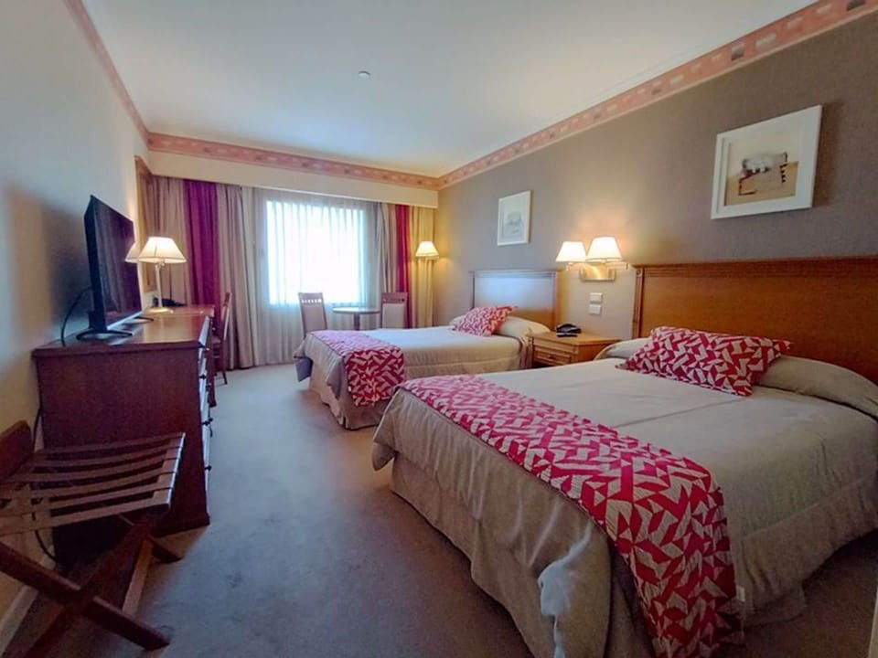 Classic Room, 2 Double Beds | Minibar, in-room safe, desk, blackout drapes