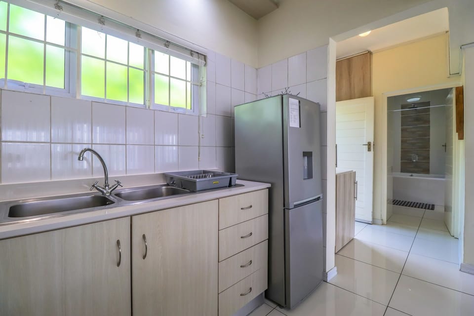 Apartment (1 Bedroom) | Private kitchen | Full-size fridge, microwave, oven, stovetop