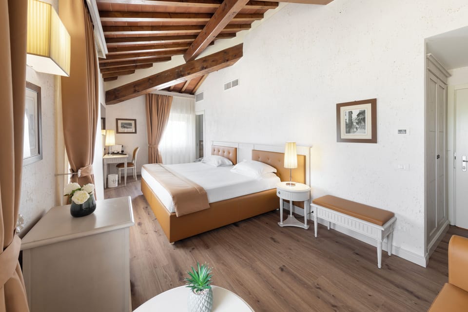 Junior Suite River View | Premium bedding, down comforters, minibar, in-room safe