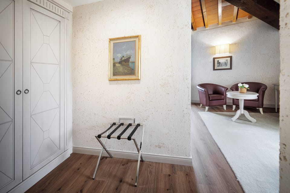 Loft with river view | Premium bedding, down comforters, minibar, in-room safe