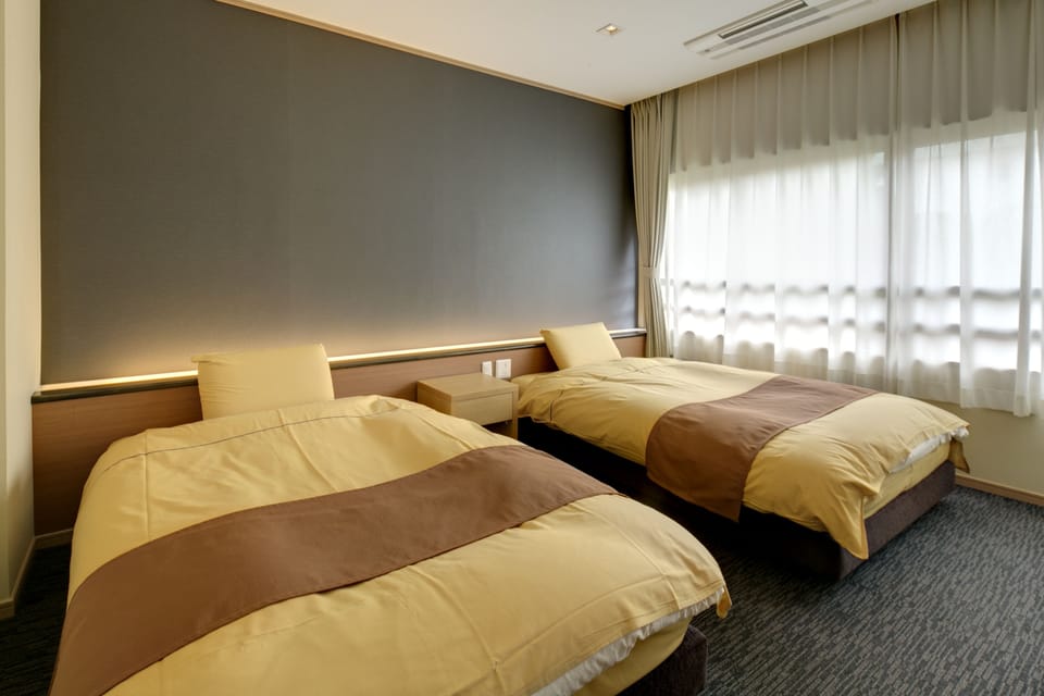 Japanese Western Style Room with Private Toilet, Non Smoking | In-room safe, blackout drapes, free WiFi, bed sheets