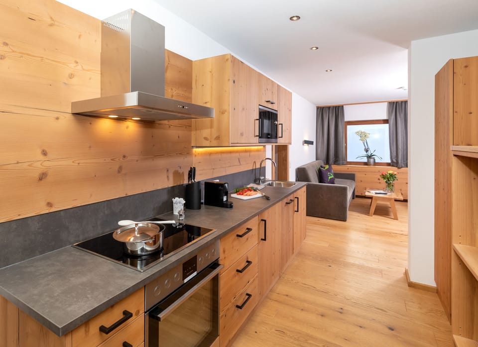 Apartment, Kitchen (Morgentau) | Private kitchen | Fridge, highchair, cleaning supplies