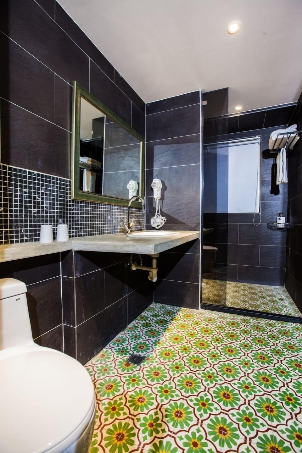 Shower, free toiletries, hair dryer, slippers