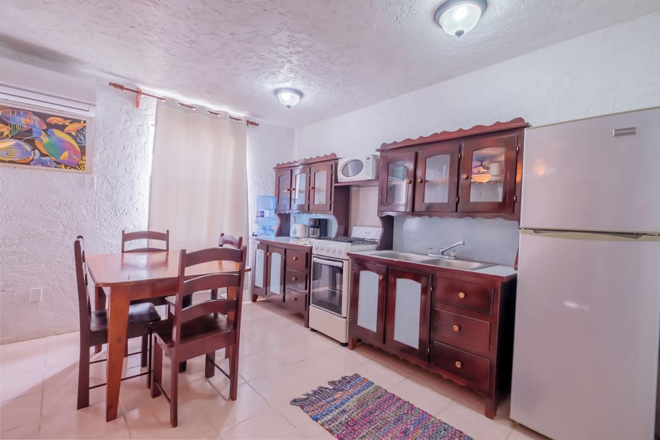 Classic Condo | Private kitchen | Full-size fridge, microwave, oven, stovetop