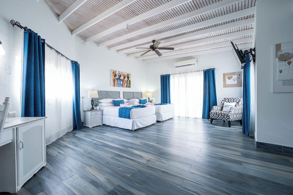 Deluxe Studio Suite, Partial Ocean View | 1 bedroom, premium bedding, in-room safe, bed sheets