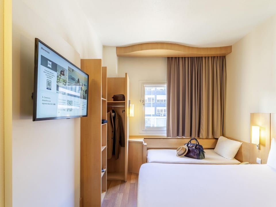 Room, Multiple Beds | In-room safe, iron/ironing board, free WiFi, bed sheets