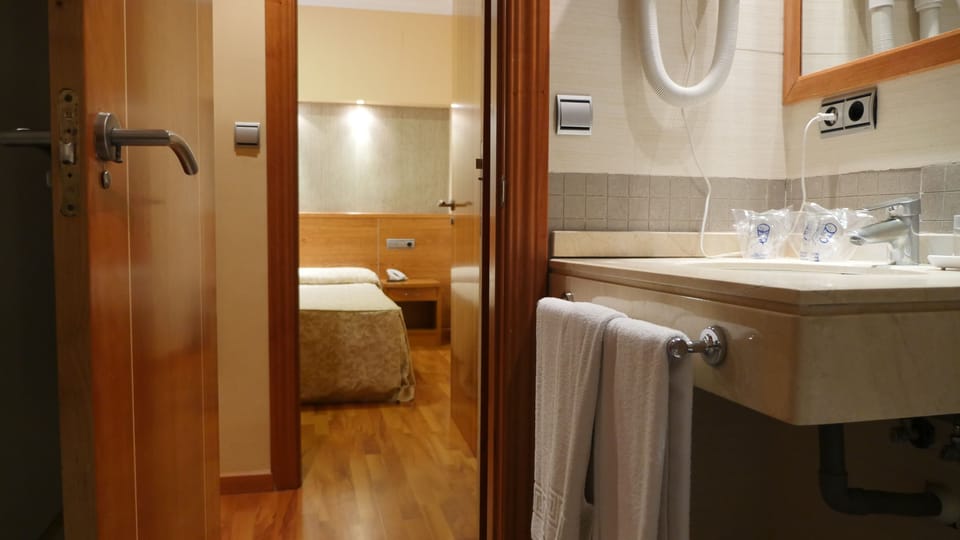 Classic Quadruple Room, 2 Bedrooms, Private Bathroom | Bathroom | Free toiletries, hair dryer, bidet, towels