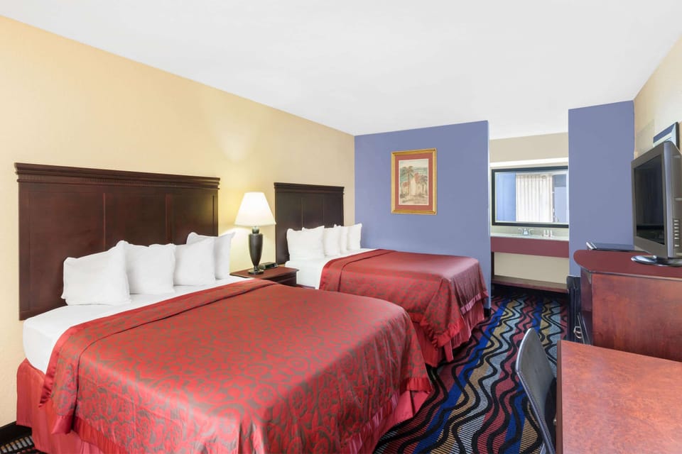 Room, 2 Queen Beds, Non Smoking | Desk, iron/ironing board, free cribs/infant beds, rollaway beds