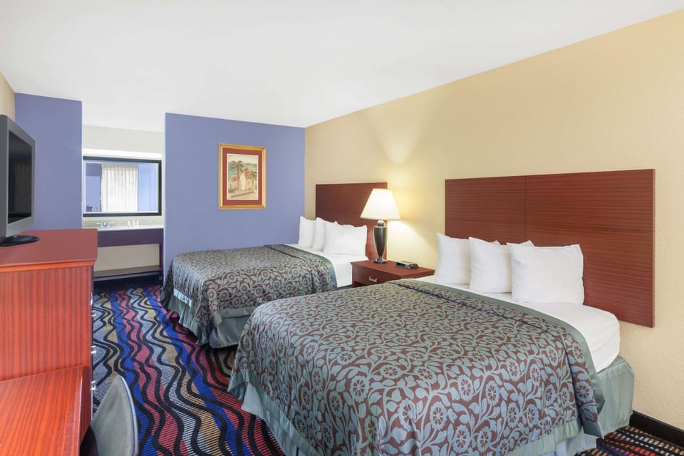 Room, 2 Queen Beds, Non Smoking | Desk, iron/ironing board, free cribs/infant beds, rollaway beds