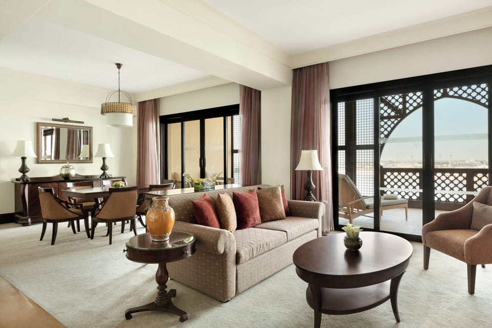 Luxury Suite (Specialty) | Living area | 40-inch LCD TV with cable channels, TV