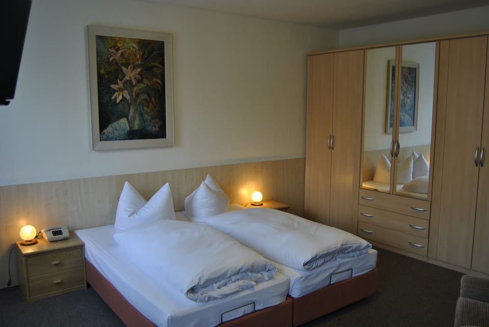 Standard Double Room | Premium bedding, pillowtop beds, in-room safe, blackout drapes