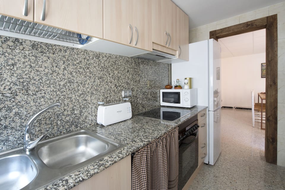 Apartment, 2 Bedrooms (5 people) | Private kitchen | Fridge, microwave, stovetop, coffee/tea maker
