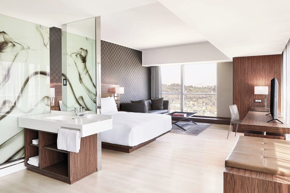 Room, 1 King Bed, Corner | In-room safe, desk, iron/ironing board, rollaway beds