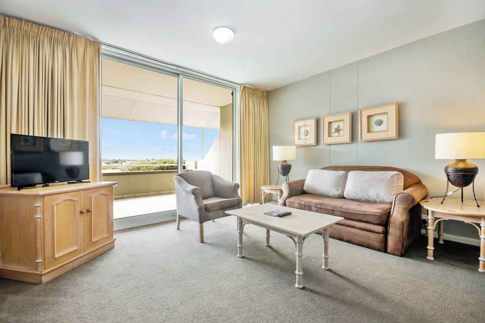 Room, Lagoon View | Living area | 82-cm LCD TV with satellite channels, TV