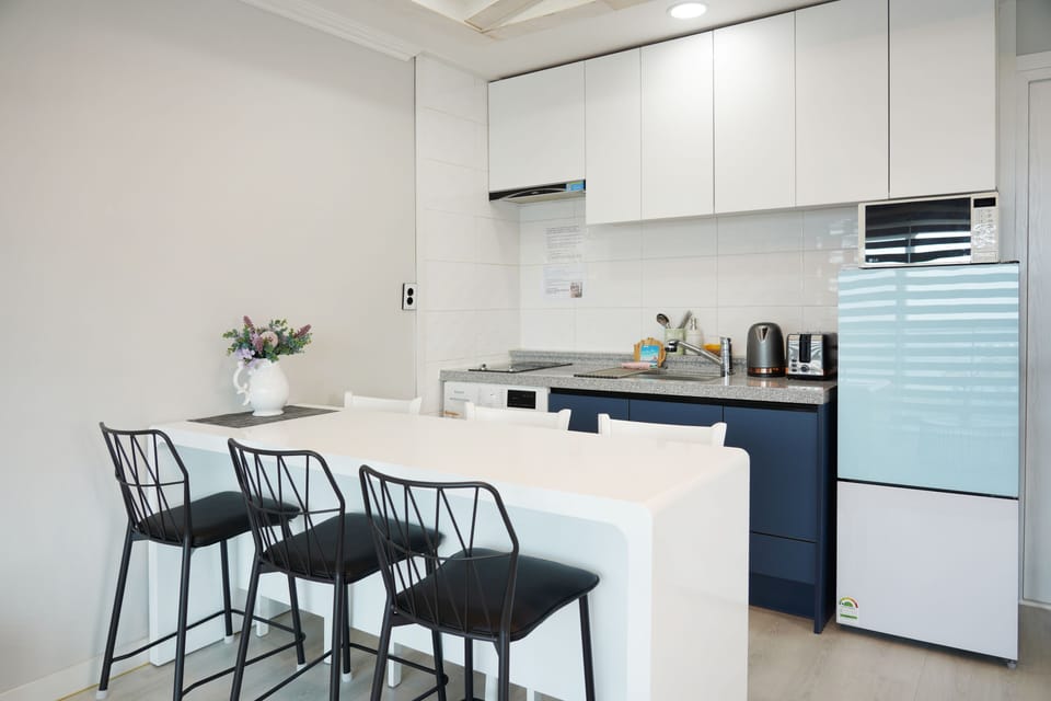 Family Triple Room, 2 Bedrooms (with 1 Living room, 32 PY) | Private kitchen | Fridge, microwave, stovetop, toaster