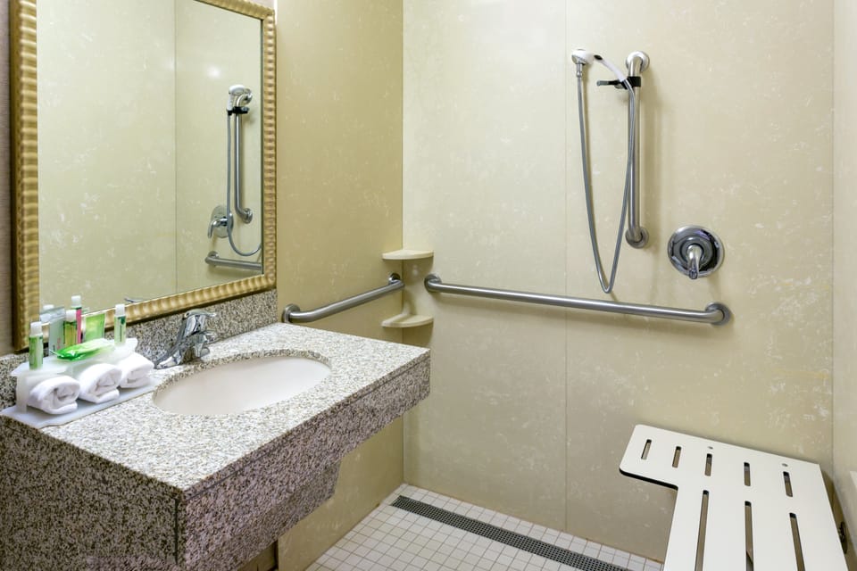 Combined shower/tub, hair dryer, towels, soap
