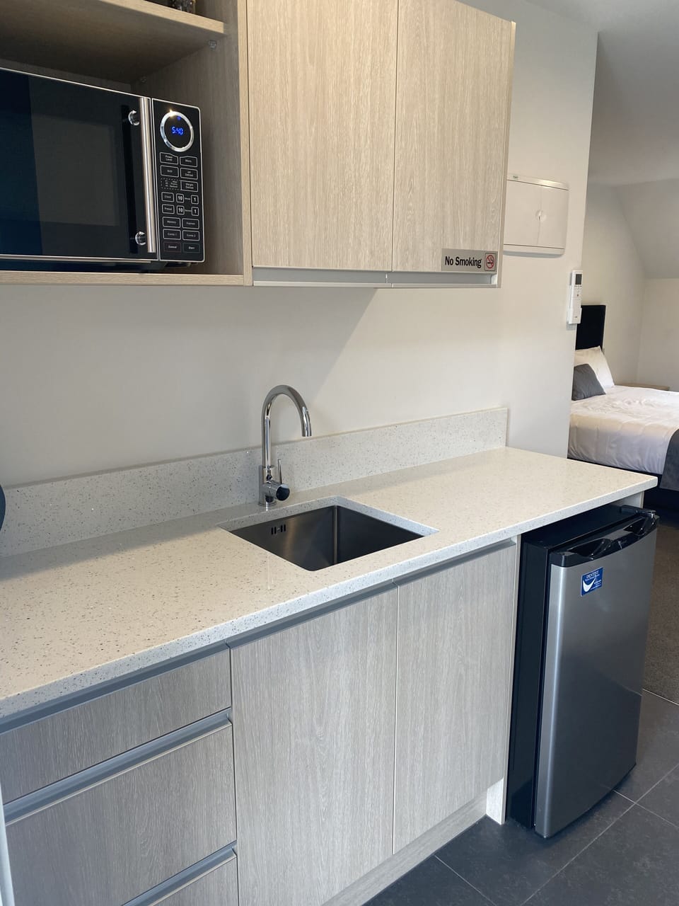 Premium Studio, 1 King Bed, Refrigerator & Microwave (First Floor) | Private kitchen | Coffee/tea maker, fridge, microwave, electric kettle