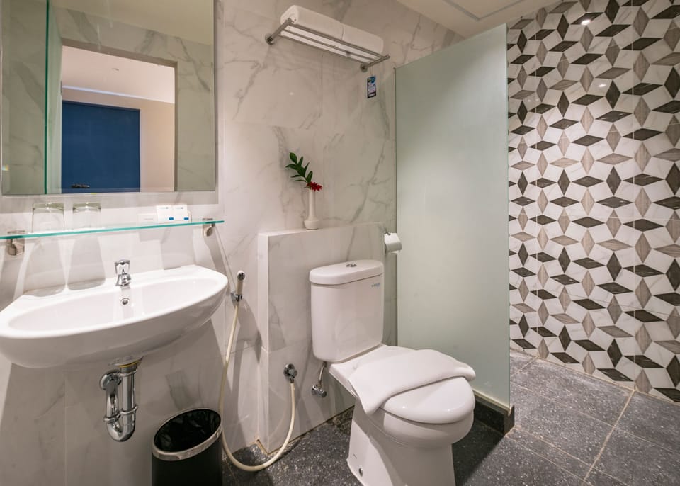 Shower, free toiletries, hair dryer, slippers