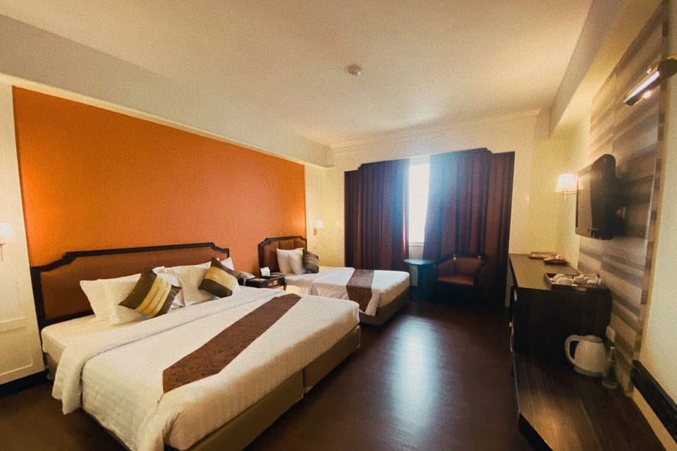 Deluxe Room  | Minibar, in-room safe, desk, blackout drapes