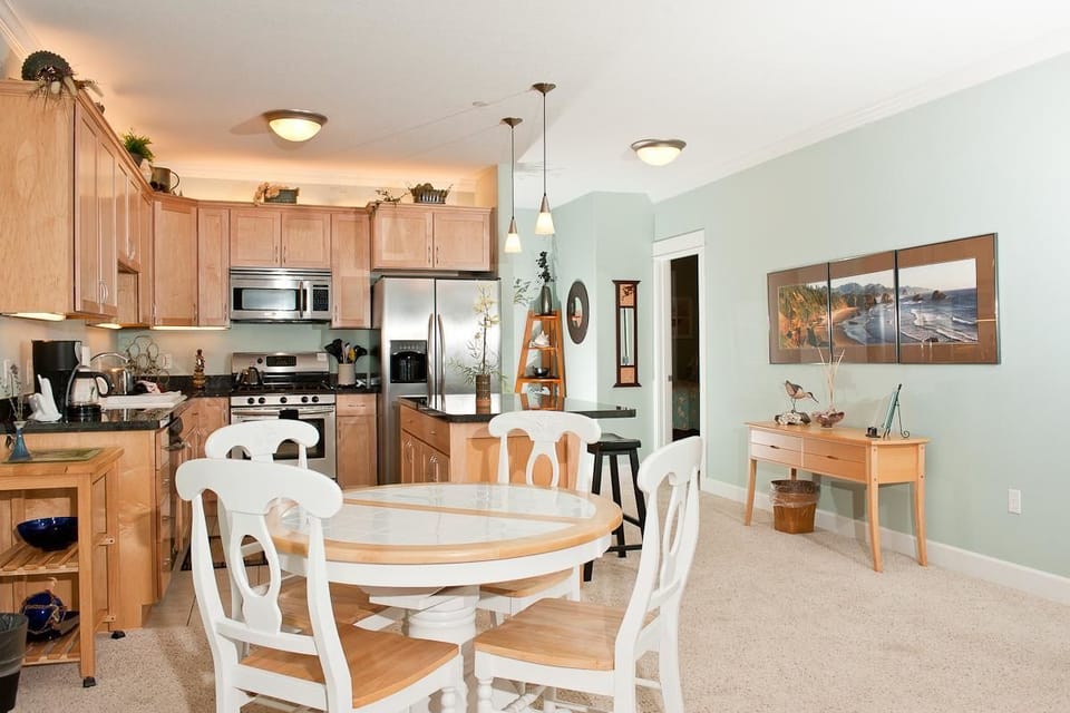 Condo, 2 Bedrooms, Ocean View, Beachfront | Living area | Flat-screen TV, DVD player